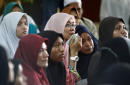 Boys 'cried from barred windows' as Islamic school blaze kills 23 in Malaysia