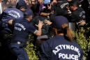 Cyprus police pepper spray protesters at shut crossing point