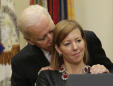Woman in viral shoulder-hug photo defends Biden