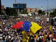 Venezuelan general backs Guaido and urges mass protests as Maduro calls for early elections