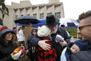 About 100 gather for 'healing service' outside synagogue
