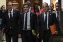 5 Catalan separatist leaders escorted to Spanish Parliament