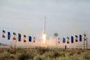 Iran says it launched military satellite as Trump threatens ships