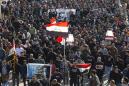 Hundreds mourn reporters shot dead after covering Iraq protests