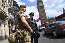 UK lowers threat level as Manchester probe advances