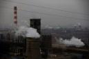 China vows fresh smog crackdown as toxic air shrouds capital