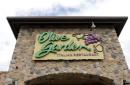 Parents charged with child abuse after Olive Garden waitress posts photo on Facebook
