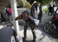 Thousands rally against Haitian president, clash with police