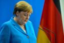 Merkel says 'very well' despite third shaking spell