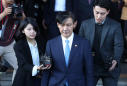 South Korean prosecutors seek arrest of ex-minister's wife