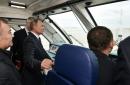 Putin takes first train across Crimea bridge