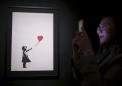 Banksy's Insane Self-Shredding Painting Is Gone But the Memes Live Forever