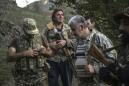 Armed villagers guard strategic gateway to Nagorno-Karabakh