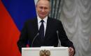 Putin signs bill targeting journalists and bloggers as foreign agents