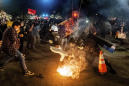 Federal agents use tear gas to clear rowdy Portland protest