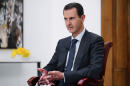 Syria's Assad fires his PM amid worsening economic crisis