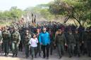 Maduro rallies military as Venezuela opposition appeals to troops