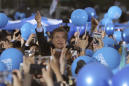 The Latest: SKorean conservative describes election as 'war'