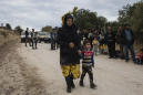 With eye on Syria, Greece expands refugee transfers
