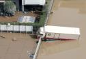 Rescuers search for survivors after Japan floods kill at least 126