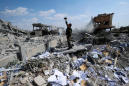 Monitor: 11 killed in blasts inside Syria weapons warehouse