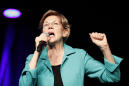The Latest: Warren calls for party unity in taking on Trump