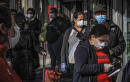 AP-NORC poll: Pandemic especially tough on people of color