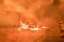 One dead as western US heat wave stunts firefighting efforts