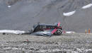 Vintage plane crashes in Swiss Alps, killing 20 on board