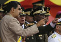 The Latest: Venezuela UN diplomat calls on Maduro to resign