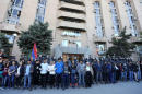 Armenian opposition demands early election on eighth day of protests