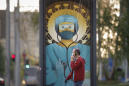 Romania: Orthodox Church blasts posters of doctors as saints