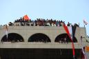 Hollow building becomes center of Iraq's uprising