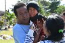 Indonesian parents reunited with son after week of tsunami anguish