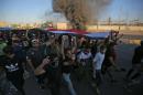 Deadly protests set stage for Iran, US tug-of-war over Iraq