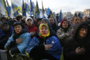 Protesters: Ukraine's leader must defend nation at summit
