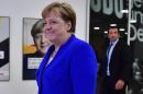 Merkel, rebel minister agree migrant deal to avert govt crisis