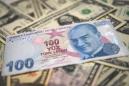Turkey lira slumps to record lows over US sanctions