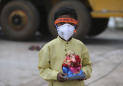 India eases virus restrictions even as cases soar