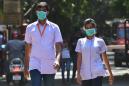 India reports first coronavirus death amid new restrictions