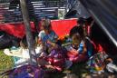 For migrant caravan's children, a long trek to a murky dream