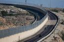 Road near Jerusalem puts wall between Israelis, Palestinians