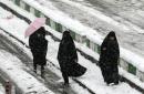 Snow shuts schools, delays flights in Iran capital