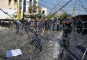 Police fire tear gas as groups clash in Lebanon capital