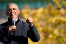 'That's what I do': Barack Obama sinks 3-pointer as Joe Biden looks on ahead of Flint rally