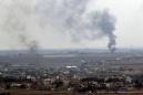 The Latest: Kurdish fighters pull out of Syrian border town