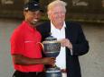 Trump tweets in defence of Tiger Woods and cites low unemployment rates for African-Americans