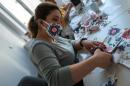 Refugees in Germany rally to help in virus battle
