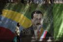 Venezuela's Maduro pardons dozens of political opponents