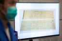 Stolen $300m Mao scroll found 'cut in half': Hong Kong police